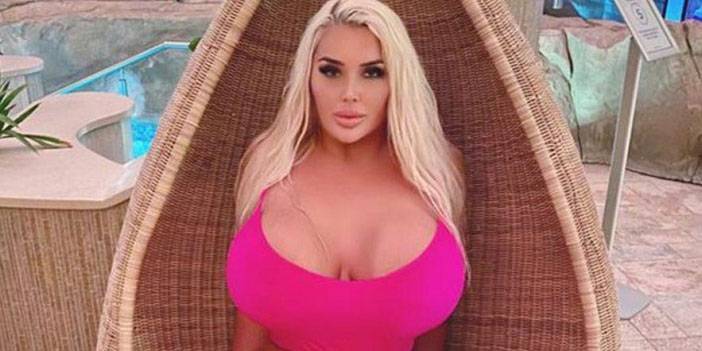 Göğüsleri için servet harcayan kadın ayakkabılarını bile bağlayamıyor