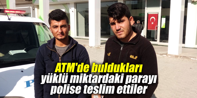 ATM'de buldukları yüklü miktardaki parayı polise teslim ettiler