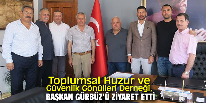 Foça Toplumsal Huzur ve Güvenlik Gönülleri Derneği, Başkan Gürbüz’ü makamında ziyaret etti