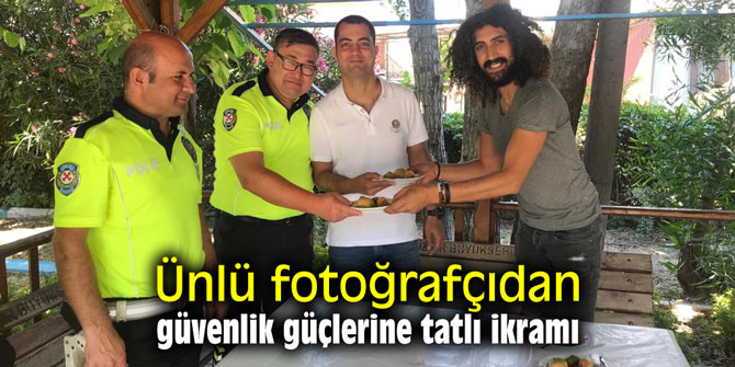 Ünlü fotoğrafçıdan güvenlik güçlerine tatlı ikramı