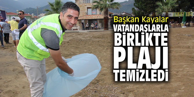 Başkan Kayalar vatandaşlarla birlikte plajı temizledi