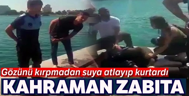 Kahraman zabıta denize düşen kadını kurtardı