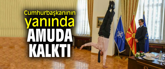 Cumhurbaşkanının yanında amuda kalktı