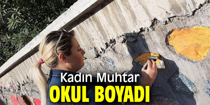 Kadın mahalle muhtarı okul boyadı!