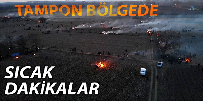 Mültecilere biber gazı ve ses bombası yağdırıyorlar.