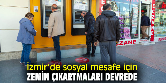 İzmir Büyükşehir Belediyesi'nden sosyal mesafe için zemin çıkartması