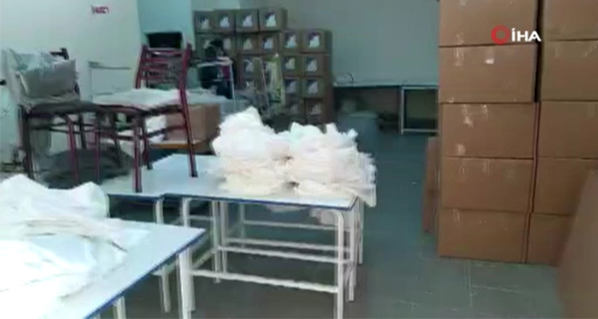 Kaçak tulum üretilen atölyeye baskın