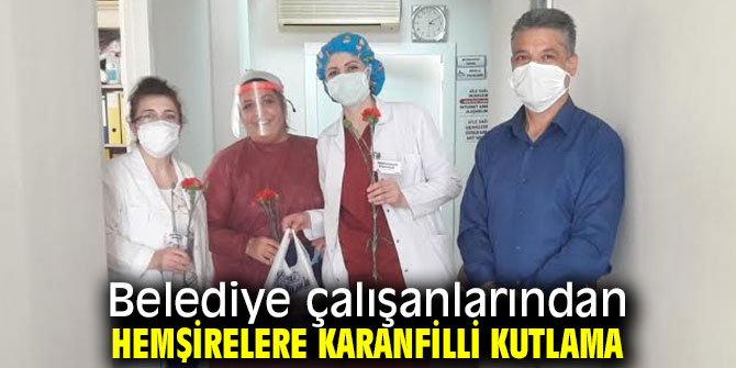 Belediye çalışanlarından hemşirelere karanfilli kutlama