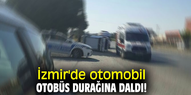 İzmir'de otomobil otobüs durağına daldı!