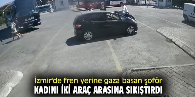 İzmir'de fren yerine gaza basan şoför, kadını iki araç arasına sıkıştırdı