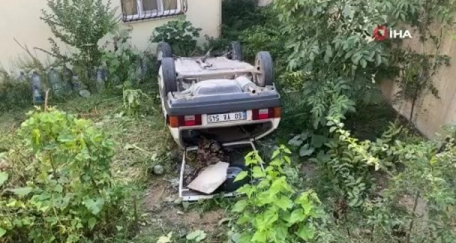 Otomobil 10 metreden evin bahçesine uçtu
