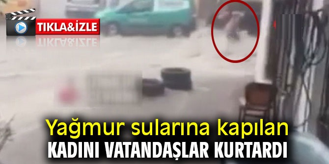 İzmir'de yağmur sularına kapılan kadını vatandaşlar kurtardı