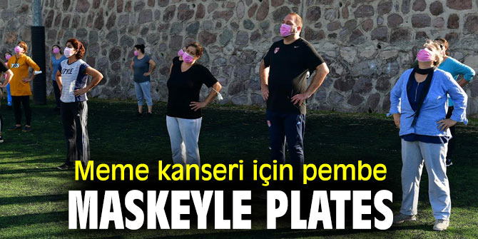 Başkan Gümrükçü pembe maske dağıttı