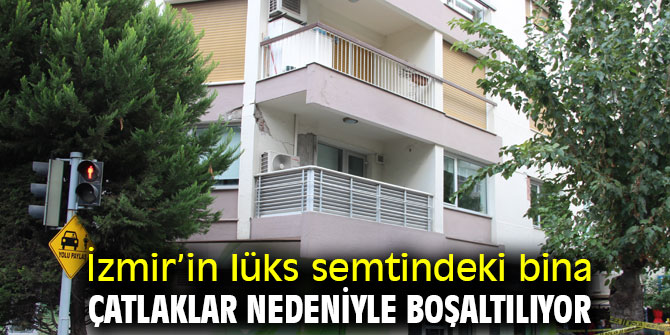 Alsancak'taki bir bina çatlaklar nedeniyle boşaltılıyor