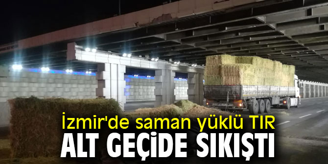 Saman yüklü TIR alt geçide sıkıştı