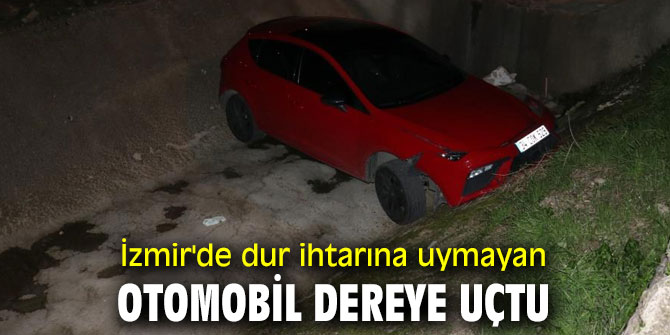 İzmir'de dur ihtarına uymayan otomobil dereye uçtu