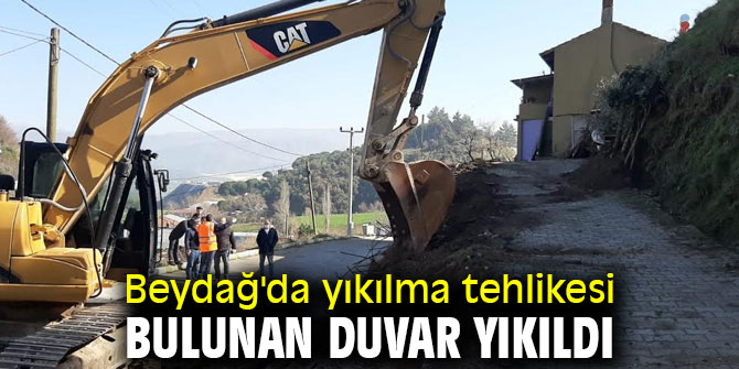 Beydağ'da yıkılma tehlikesi bulunan duvar yıkıldı