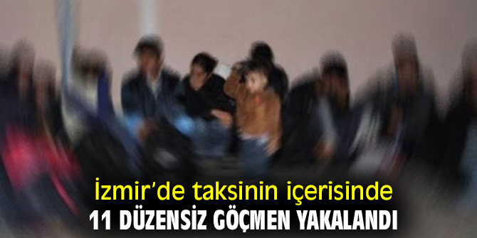 İzmir’de taksinin içerisinde 11 düzensiz göçmen yakalandı