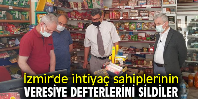 İzmir'de ihtiyaç sahiplerinin veresiye defterlerini sildiler