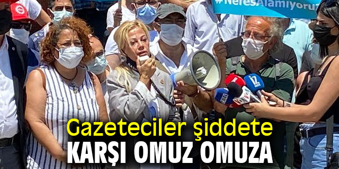 Gazeteciler şiddete karşı omuz omuza