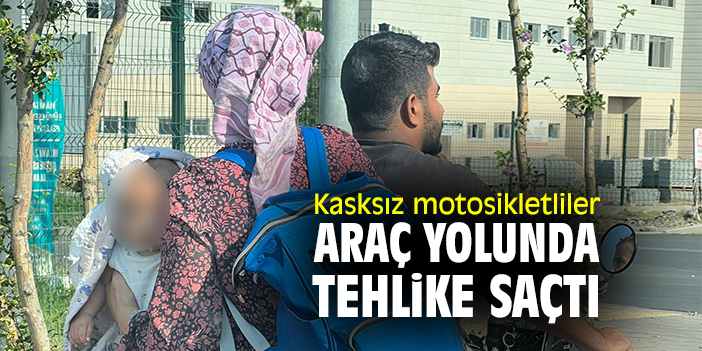 Kasksız motosikletliler araç yolunda tehlike saçtı
