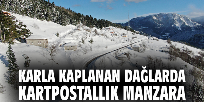 Karla kaplanan dağlarda kartpostallık manzara