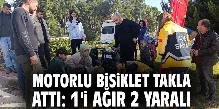 Motorlu bisiklet takla attı: 1'i ağır 2 yaralı