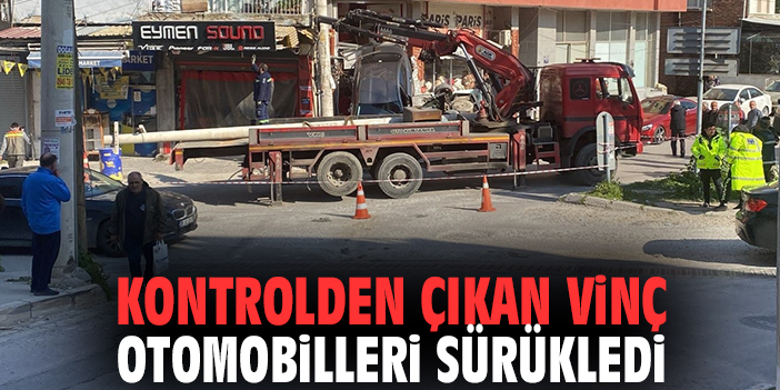 Kontrolden çıkan vinç otomobilleri sürükledi