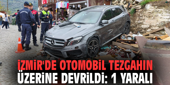 İzmir'de otomobil tezgahın üzerine devrildi: 1 yaralı