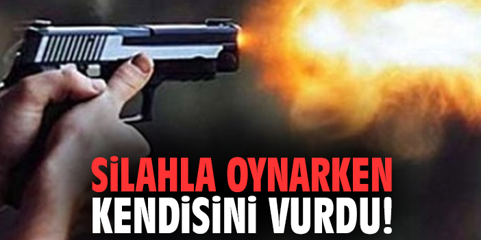 Silahla oynarken kendisini vurdu!