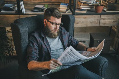 stock-photo-man-reading-newspaper.jpg
