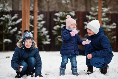 three-kids-playing-winter-day-brothers-with-yongest-sister.jpg