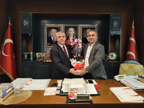 karabag-ailesi-kultur-ve-dayanisma-dernegi-baskani-huseyin-karabag-mhp-izmir-il-baskani-veysel-sahin.jpeg