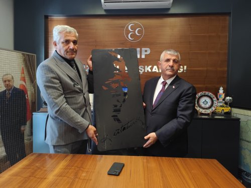 serhat-karslilar-federasyonu-baskani-bora-kocu-mhp-izmir-il-baskani-veysel-sahin.jpeg