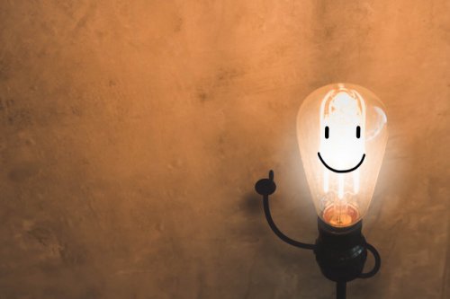 light-bulb-with-smile-face-concept-old-concrete-wall-background_7191-367.jpg